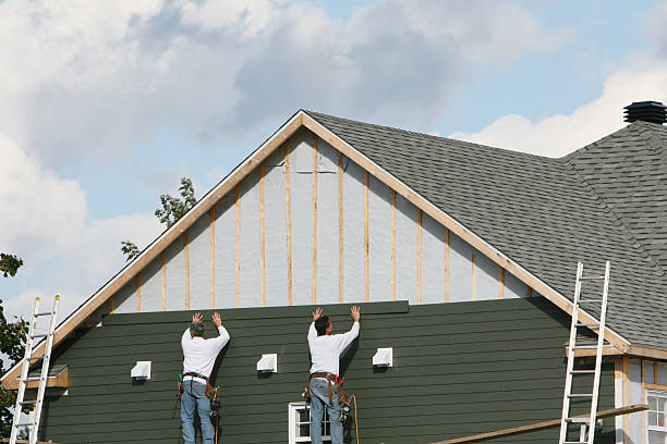 Professional Siding Installation technician working in Naperville, IL